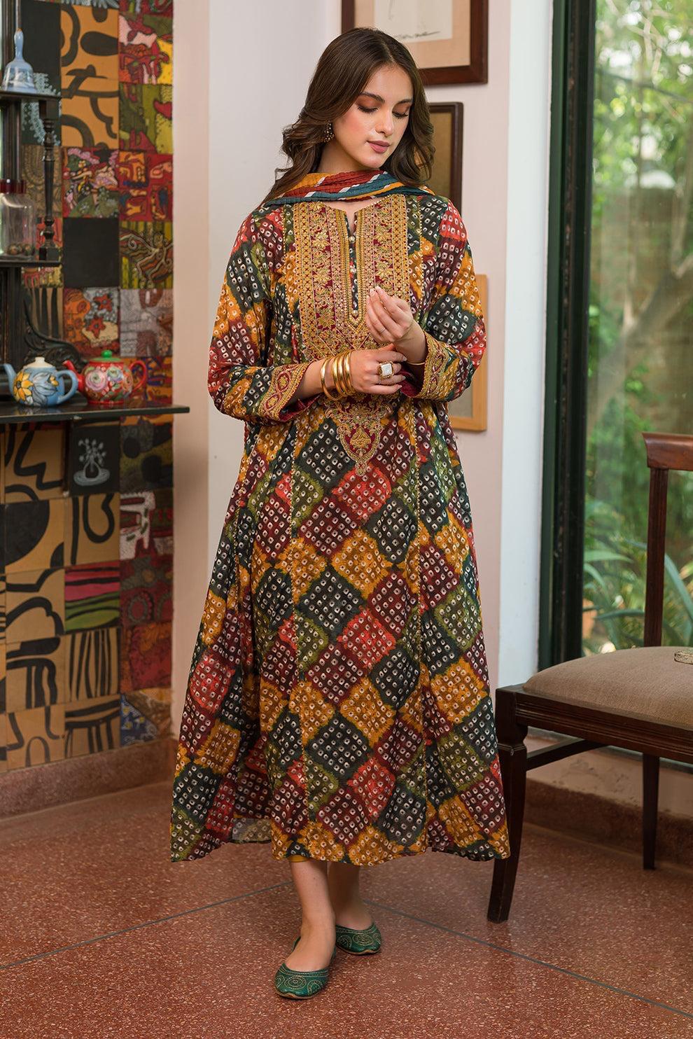 Declare Pakistan chunri print frock worn by model outdoors, showcasing authentic Pakistani fashion.
