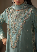 Ice Blue lue Embroidered 3-Piece Suit – KH Raw Silk Kurta, Flared Trouser & Net Dupatta