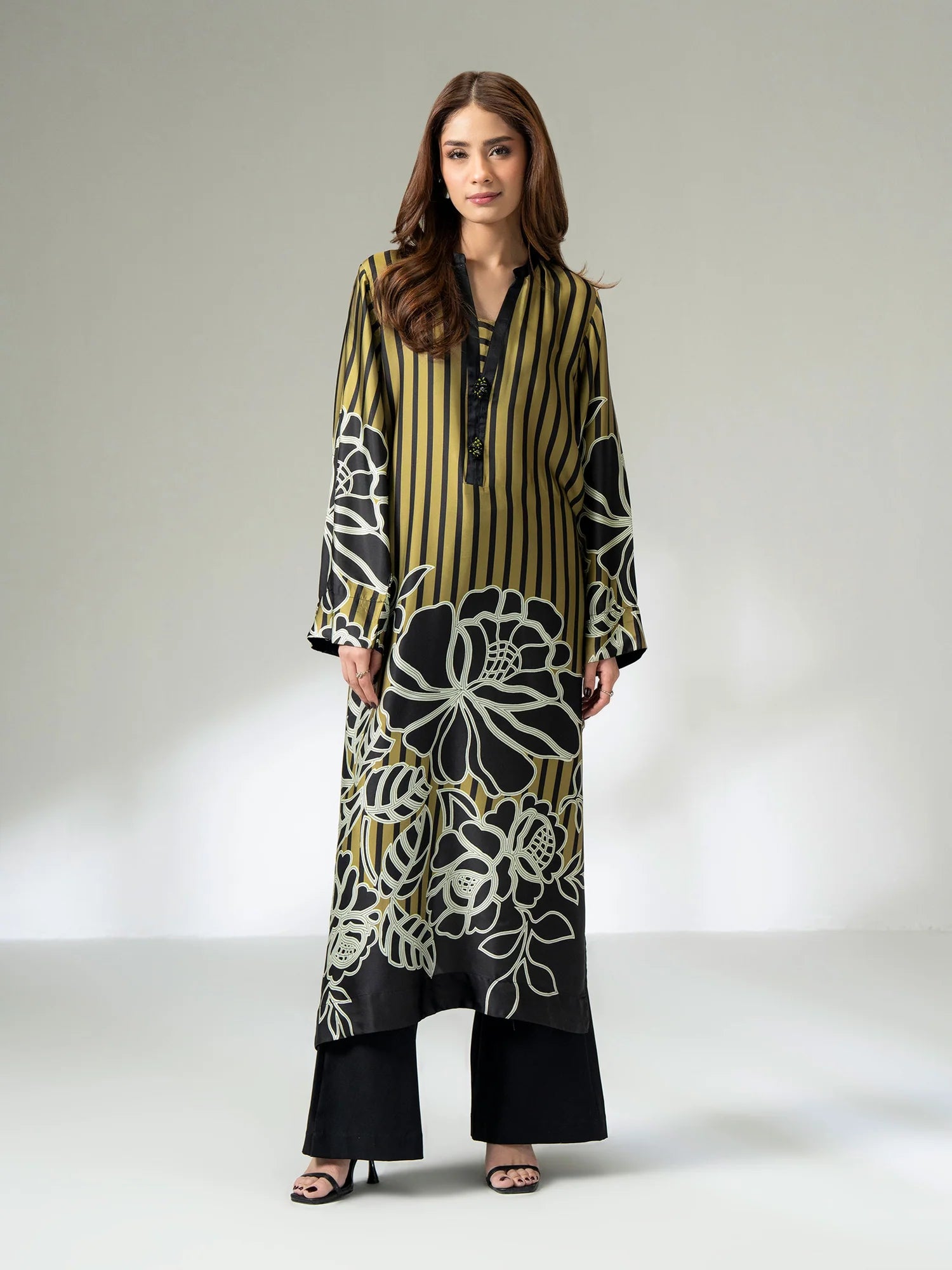 Olive printed silk long shirt with bead embellishment on the placket, front view.1