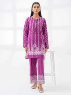 Woman wearing a limelight pink lilencoord set from limelight pakistani salenmore sizes S to L