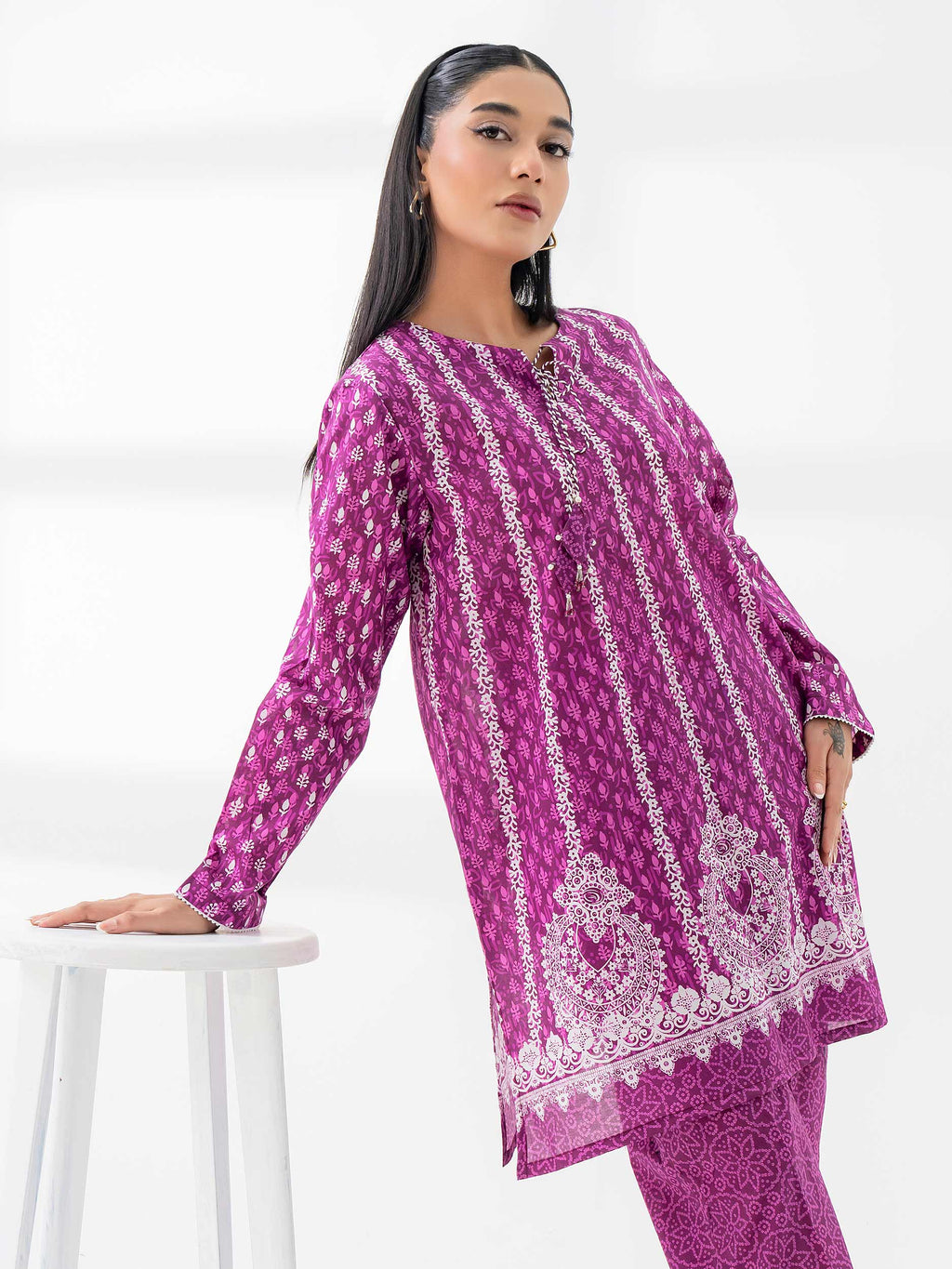 Woman wearing a limelight pink lilencoord set from limelight pakistani salenmore sizes S to L