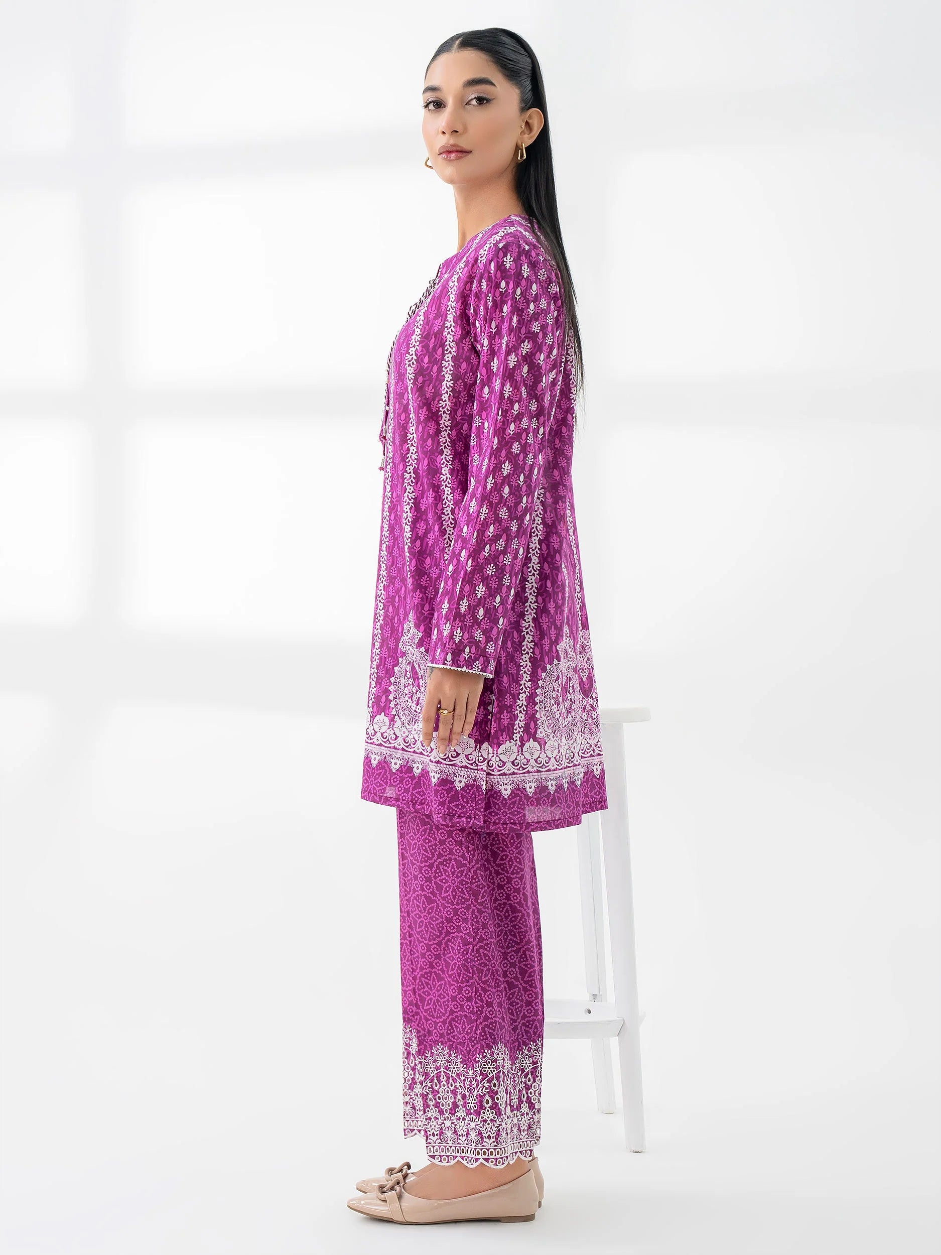 Woman wearing a limelight pink lilencoord set from limelight pakistani salenmore sizes S to L