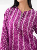 Woman wearing a limelight pink lilencoord set from limelight pakistani salenmore sizes S to L